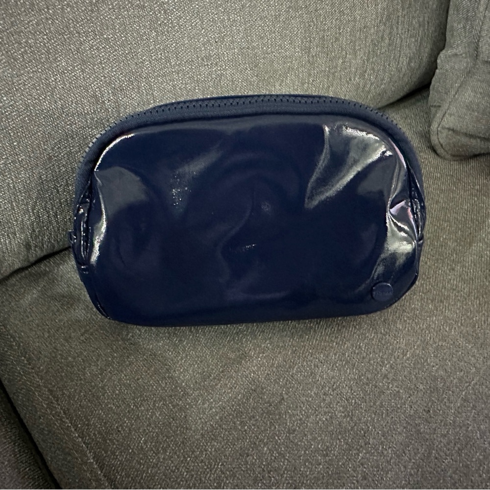 Compact Blue Toiletry Bag with Glossy Finish
